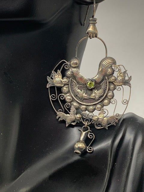 Birds and water carrier earrings