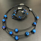Black 10-Strand Piano Wire Bracelet with Blue Geodes