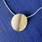 Brass “Silver Dollar” Pendant Necklace