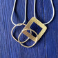 Abstract Brass and Titanium Pendant Necklace