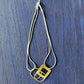 Abstract Brass and Titanium Pendant Necklace