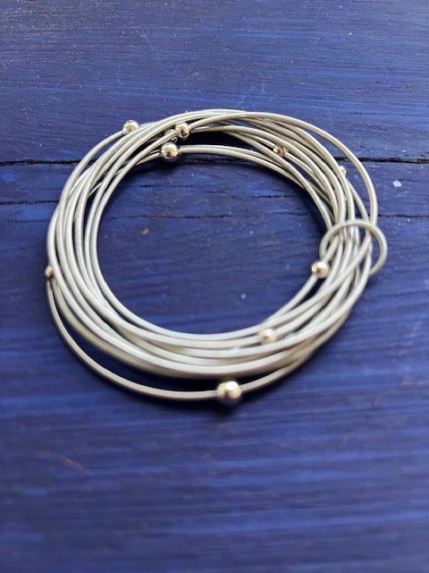 Silver Piano Wire Bracelet With Silver Beads