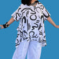 Transparente Ruffled Gibberish Tunic