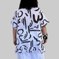 Transparente Ruffled Gibberish Tunic