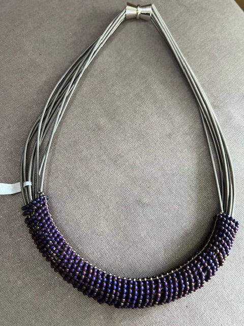 Piano Wire Necklace with Purple Bead Rings