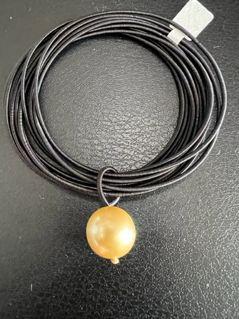 Black Piano Wire Bracelet with Gold Pearl