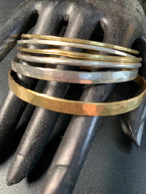 Set of Brass and Titanium Bracelets