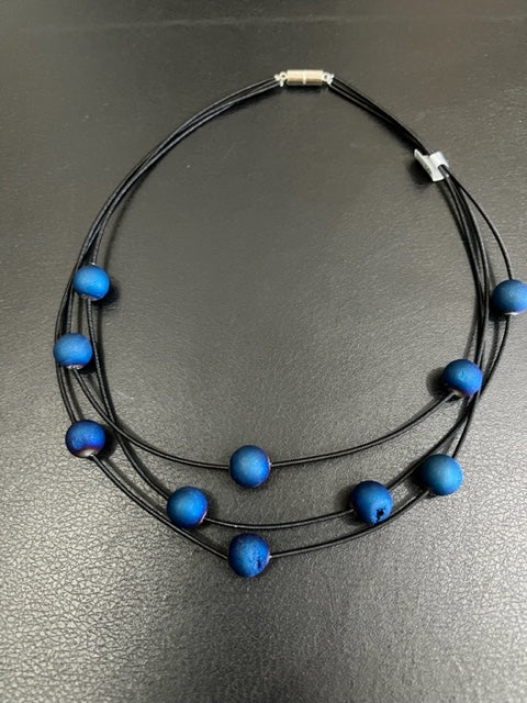 Black 3-Strand Piano Wire Necklace with Layered Blue Geodes