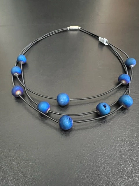 Black 3-Strand Piano Wire Necklace with Layered Blue Geodes