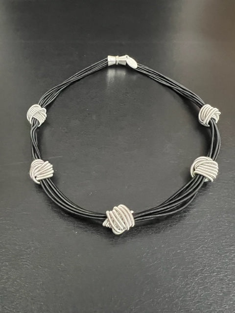 Black Piano Wire with Silver Knots